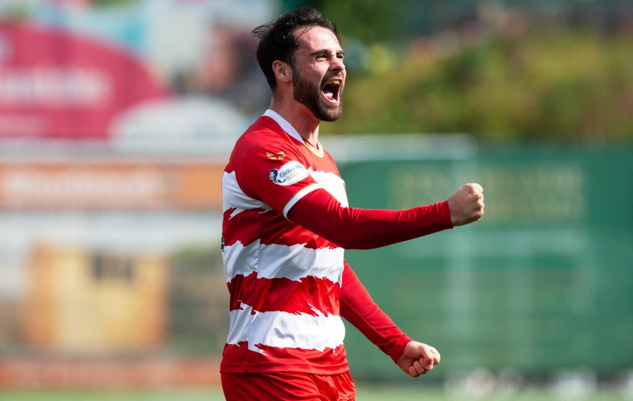 Former Raith Rovers full-back Reghan Tumilty celebrates Hamilton Accies' winning goal.