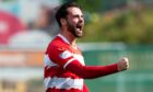 Reghan Tumilty celebrates scoring for Hamilton.