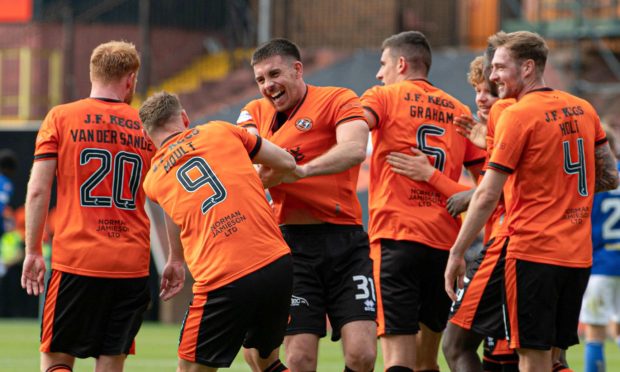 Delighted Dundee United players celebrate