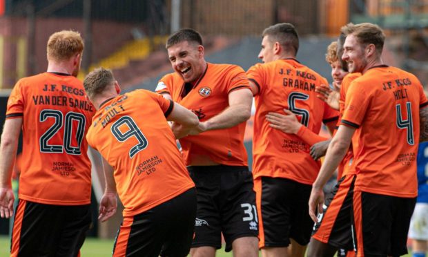 Delighted Dundee United players celebrate