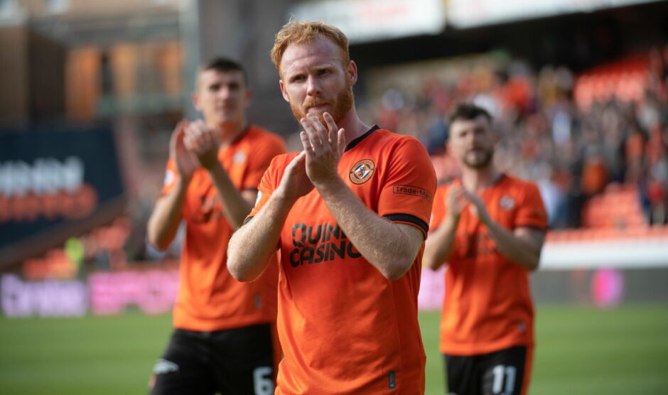 Van der Sande takes the acclaim of the Dundee United fans