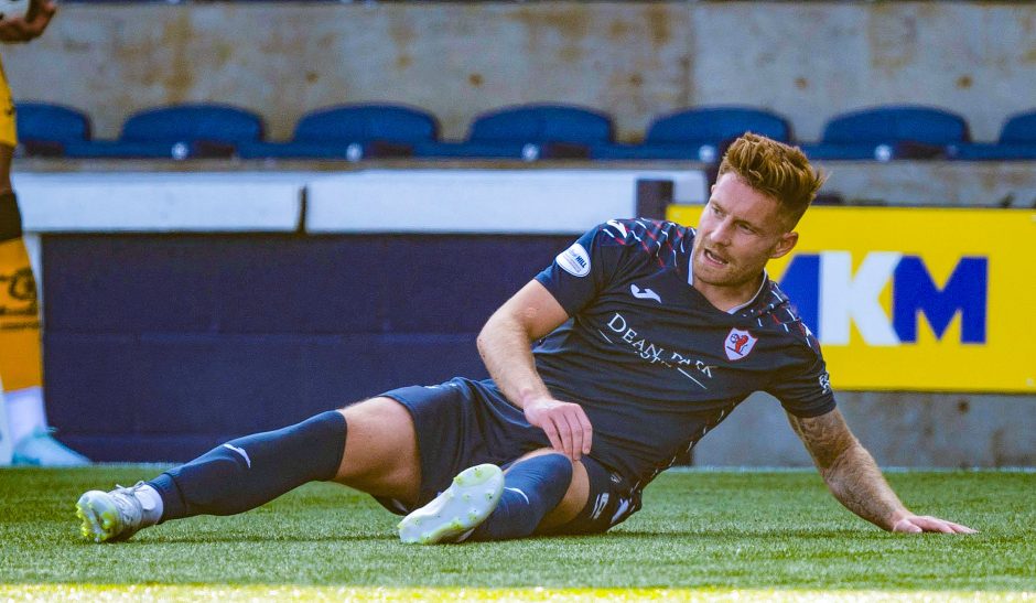 Raith Rovers defender Euan Murray lies on the Stark's Park pitch.