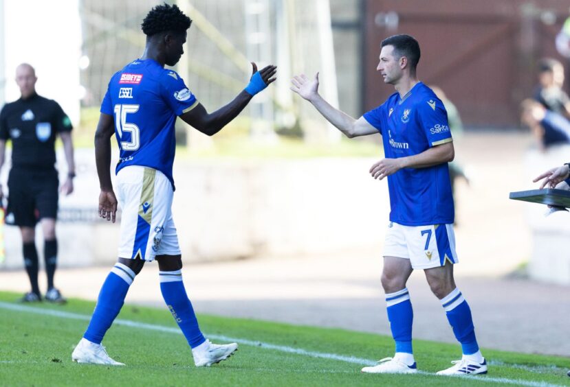 Jason Holt will be able to help Aaron Essel, with the two pictured high-fiving each other