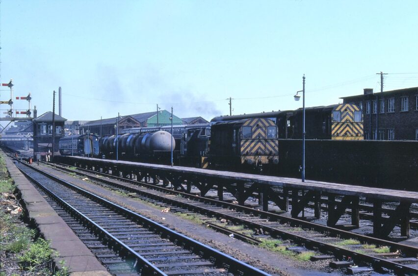 A stretch of track and freight trains at Dundee station. 