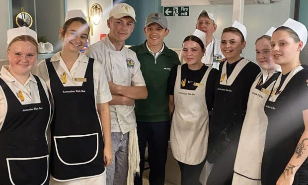 Tom Holland with Anstruther Fish Bar staff