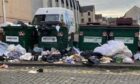 Overflowing bins on Daniel Street, Dundee, earlier this summer. Image: Kieran Webster/DC Thomson