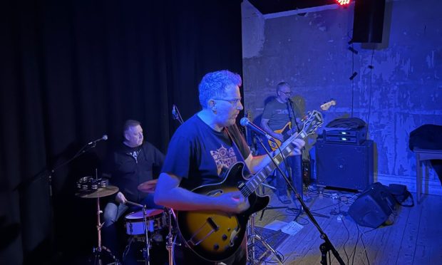 Alan Clarke performing with Broken by Rock bandmates, Andrew Clarke and Derek McKee. Image: Alan Clarke.