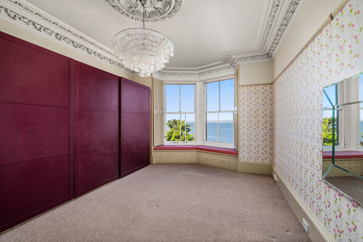 A bedroom with views of the River Tay.