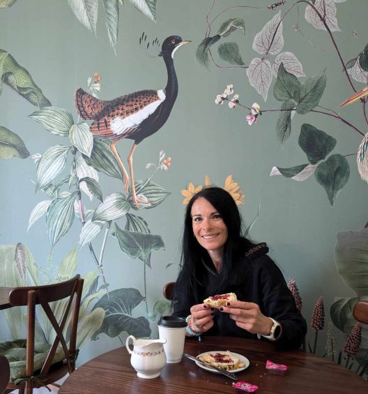 Gayle enjoys coffee and a scone at Brechin Castle's newly restored tearoom.