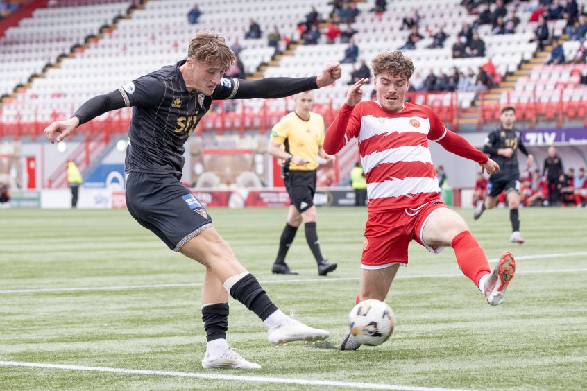 Dunfermline Athletic FC striker Lewis McCann fires a shot at goal against Hamilton Accies.