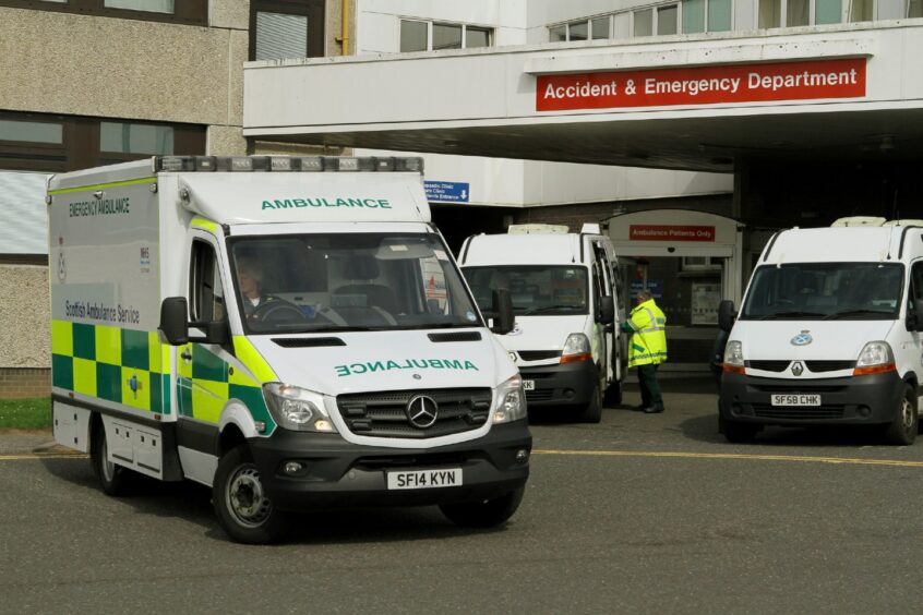 Ambulances waiting outside Ninewells Hospital in Dundee. 