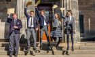 Ed, Jaydan, Shan, Amy and Mariella jump for joy at their exam results. Image: Elliott Cansfield.