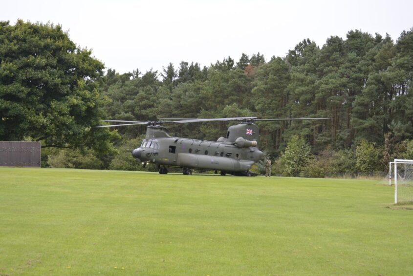 The Chinook landed on the school playing fields.