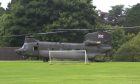 The RAF chinook landed on Canongate primary School's playing fields in St Andrews.