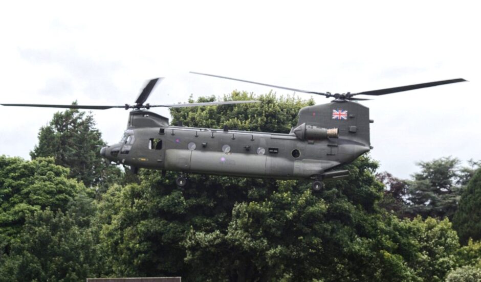 The chinook coming in to land at Canongate Primary School in St Andrews.