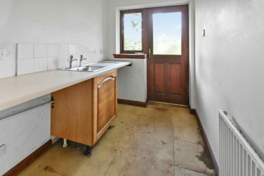 The separate utility room.