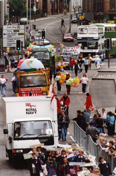 A range of vehicles in the 1994 Dundee Festival parade.