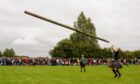 The caber toss at Stirling Highland Games 2024. Image: Bryan Robertson