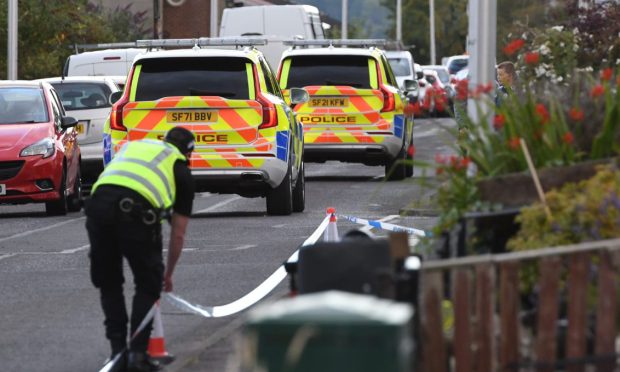 Police at the corner of Campsie Road and Dunsinane Drive in Letham, Perth.