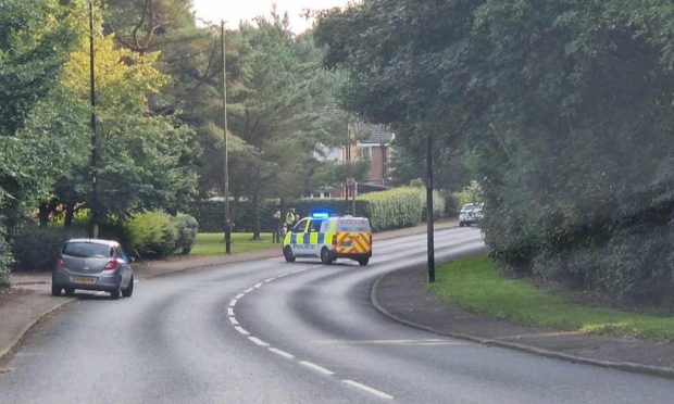 Police closed Dalmahoy Drive on Saturday after a child was hit by a car.