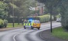 Police closed Dalmahoy Drive on Saturday after a child was hit by a car.