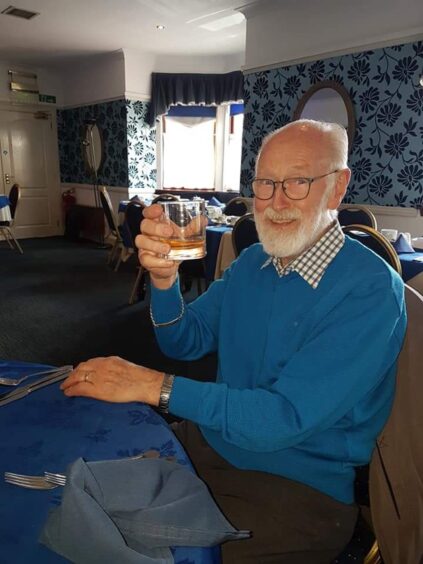 Jim enjoying a wee dram on his 81st birthday at the former Broughty Ferry Hotel.