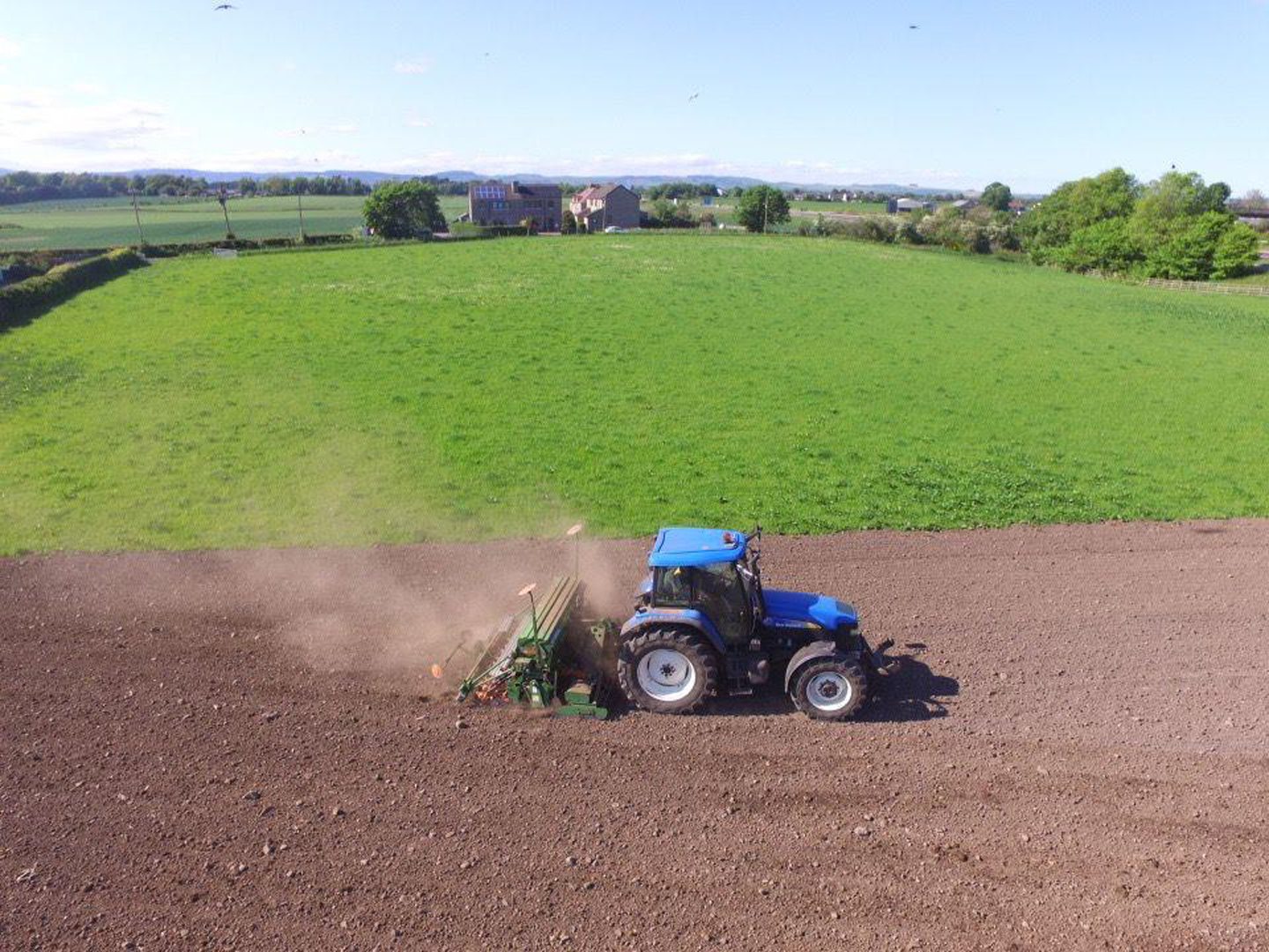 A tractor planting sunflower seeds at Fruix Farm this spring. Image: Fraser Turnbull