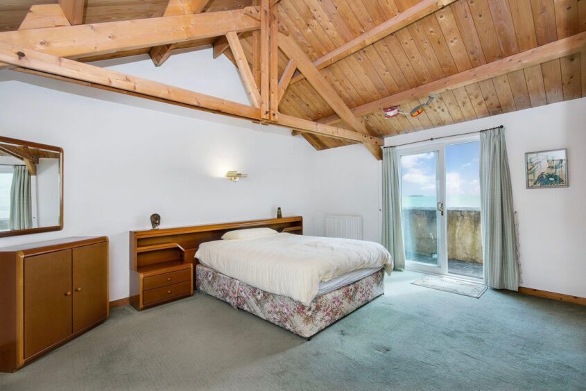 Master bedroom opens out onto a terrace.