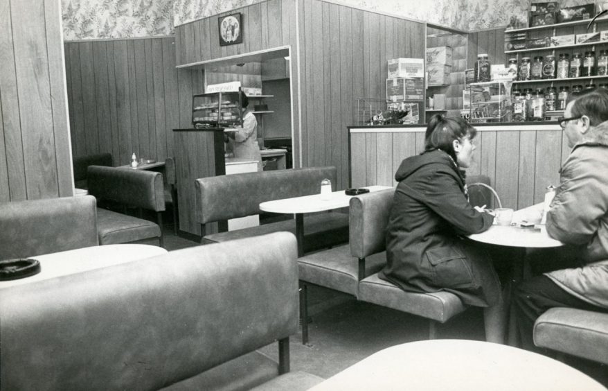 Customers in a booth at the Granada Café.