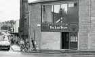 Youngsters outside the Last Tram pub in Lochee in 1985.