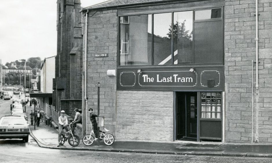 Youngsters outside the Last Tram pub in Lochee in 1985.