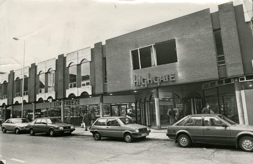 cars parked outside the entrance to the Highgate Centre in 1987.