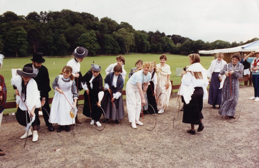 Pupils and staff of Gowriehill Primary School outside in period dress