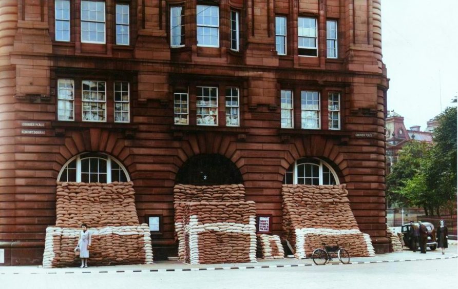 Sandbags piled against the entrances outside DC Thomson in Meadowside in 1939. 