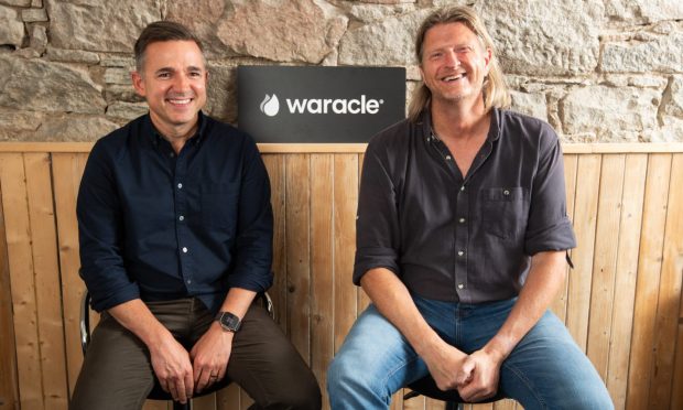 Change at the top of Dundee tech firm Waracle - new CEO David Tuck with former chief executive Chris Martin. Image: Waracle