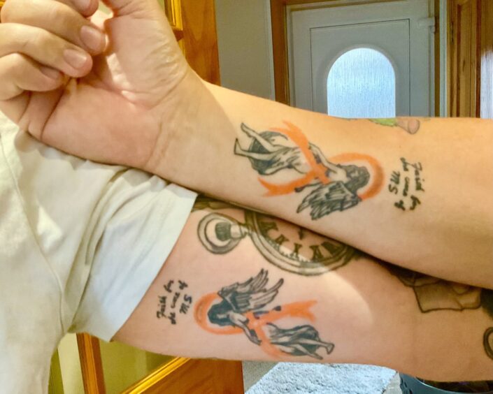 Fife dad Ian Steedman and his son Greg got matching 'Faith for the cure of MS' tattoos.