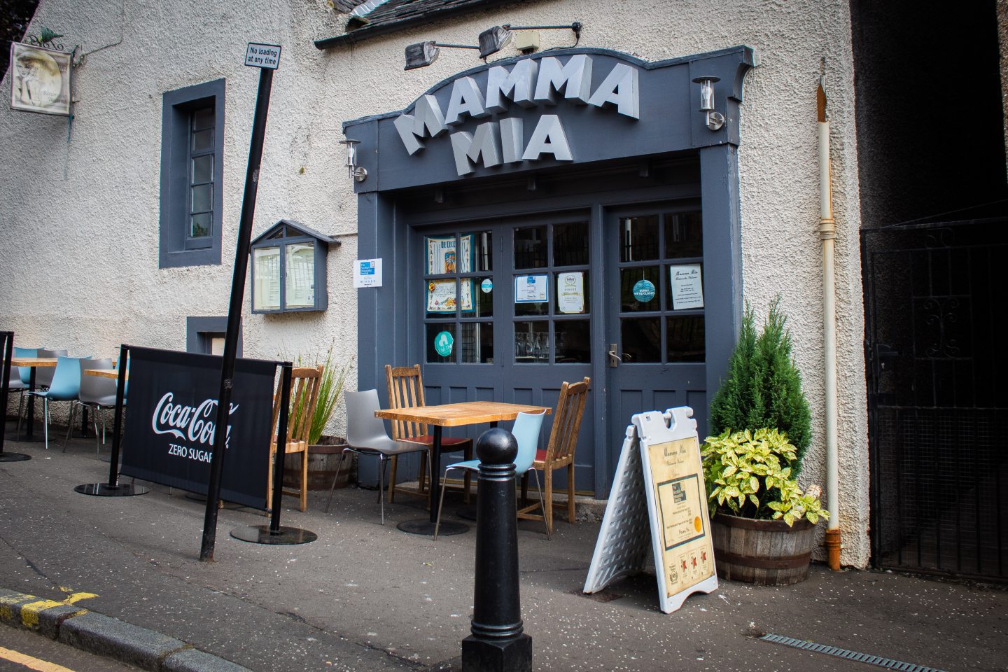 Exterior of restaurant. Sign reading 'Mamma Mia'