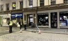 Police on Reform Street after the alleged stabbing. Image: Ellidh Aitken/DC Thomson