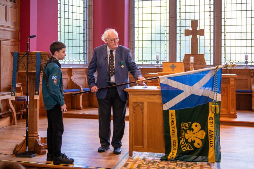 Glamis Scout group flag returns home in historic ceremony.