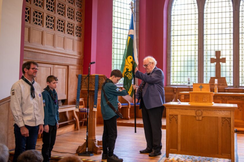 Glamis Scout group flag returns home in historic ceremony.