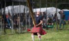 Bruce Robb in the caber tossing at Glenisla Games. Image: Kim Cessford / DC Thomson