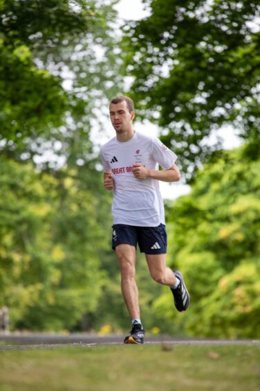 Ben Sandilands running in Beveridge Park