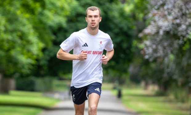 Ben Sandilands running in Beveridge Park.