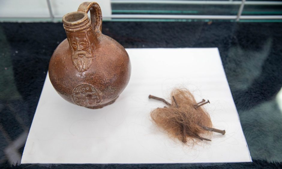 A witch bottle found buried in the walls of a house in Pittenweem