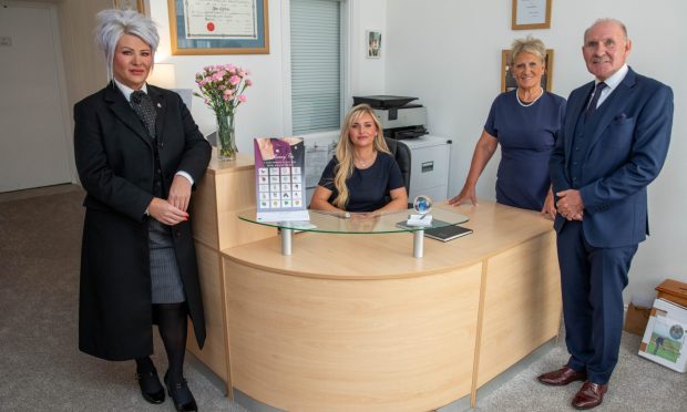 Funeral director Angela (left), sister Kirsty, mum Norma and dad John. Image: Kenny Smith/DC Thomson.