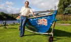 David Gilbertson and his skiff at The Perth Coastal Rowing Club. Image: Kenny Smith/DC Thomson