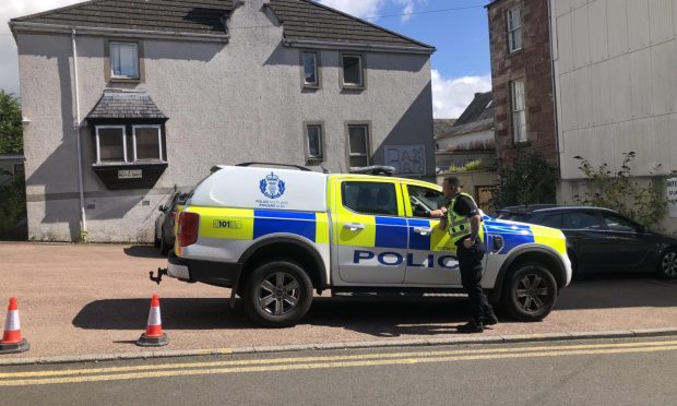 Police at the former Royal Hotel Blairgowrie. Image: James Simpson/DC Thomson