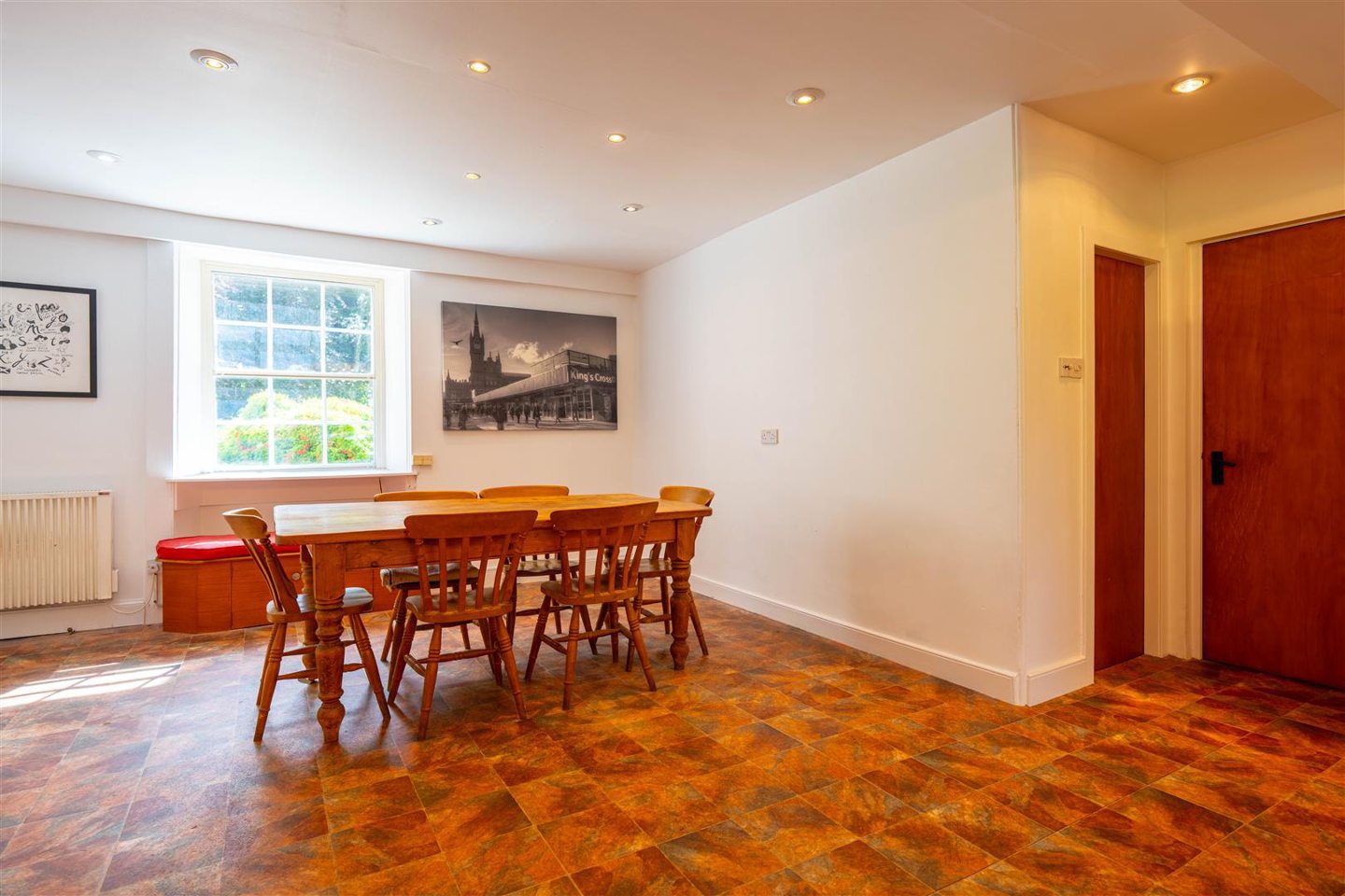 A dining table in the kitchen.