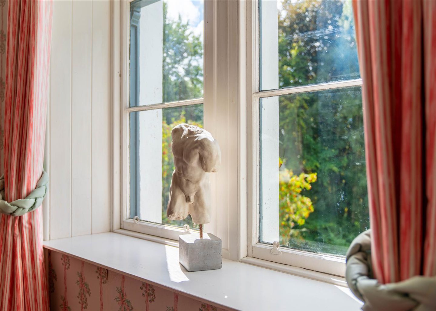 A statue in one of the bedrooms.