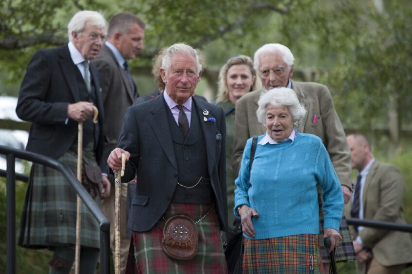 Lady Airlie with Prince Charles at Glenisla Games in 2019.